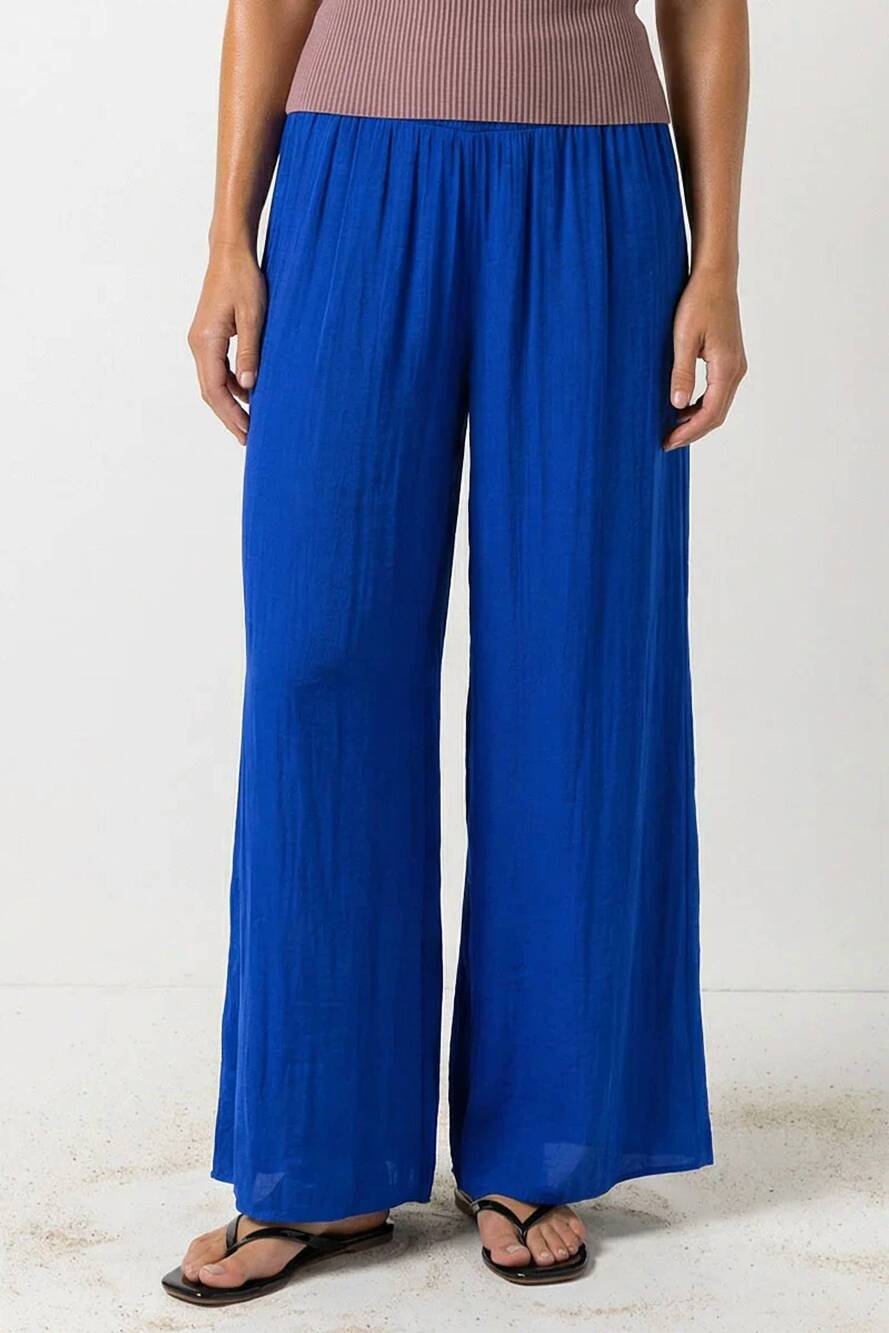 NEW NAKED ZEBRA women's smocked waist wide leg pant in capri blue